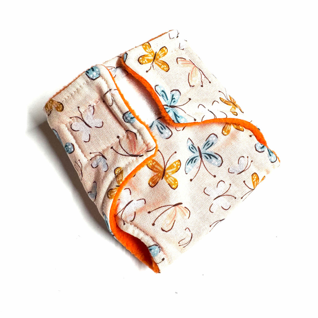 Couche poupée • Papillon