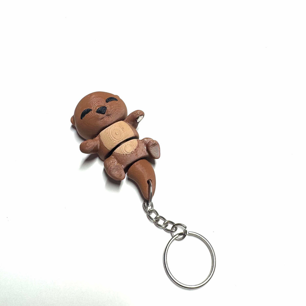 Porte clé •  Bébé loutre